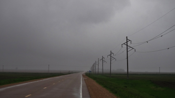 Minnesota long farm highway clouds rain