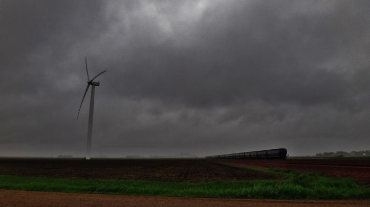 Minnesota train windmill cloudy dark skies